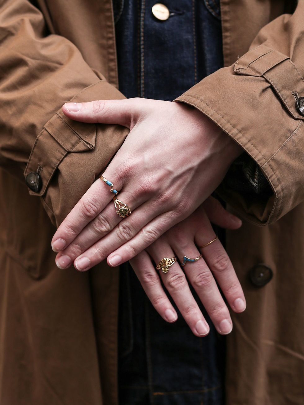 Hand, Outerwear, Finger, Jacket, Nail, Gesture, Interaction, Beige, Coat, Fashion accessory, 