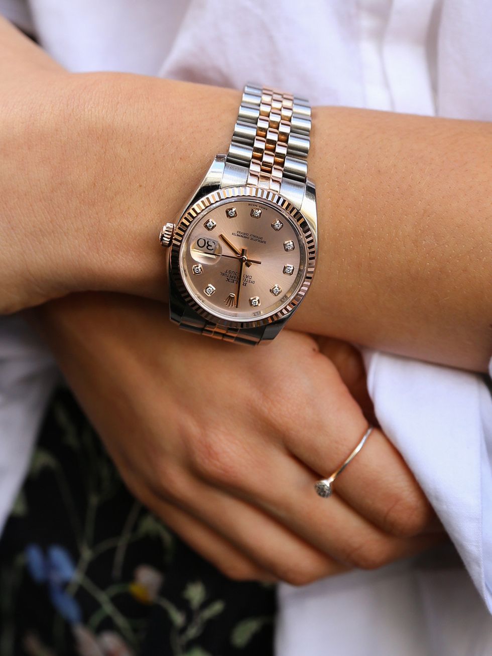 Finger, Watch, Analog watch, Wrist, Hand, Photograph, White, Fashion accessory, Watch accessory, Font, 