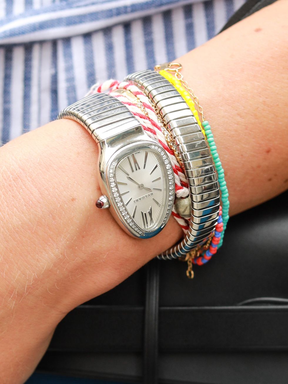 Analog watch, Wrist, Watch, Fashion accessory, Bracelet, Jewellery, Watch accessory, Turquoise, Arm, Hand, 