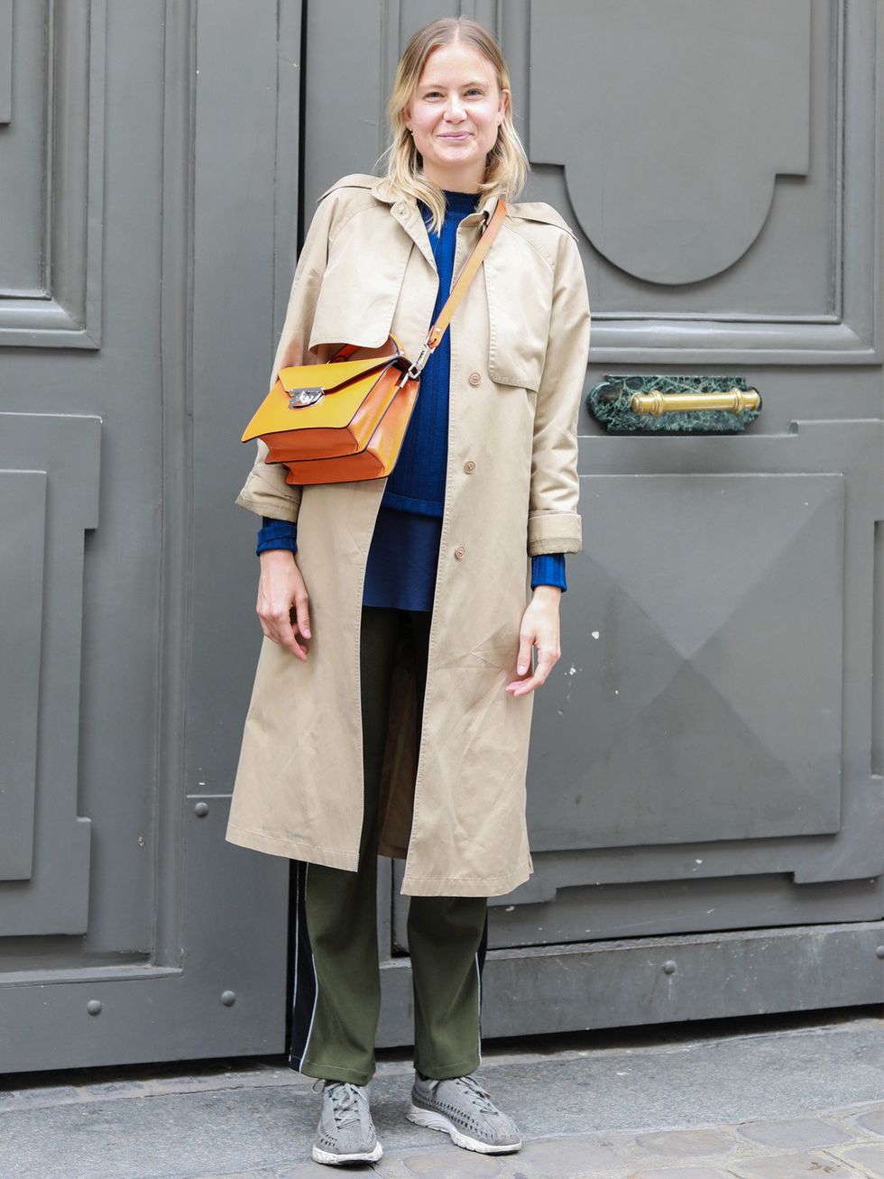 Clothing, Street fashion, Trench coat, Fashion, Coat, Yellow, Overcoat, Outerwear, Beige, Footwear, 