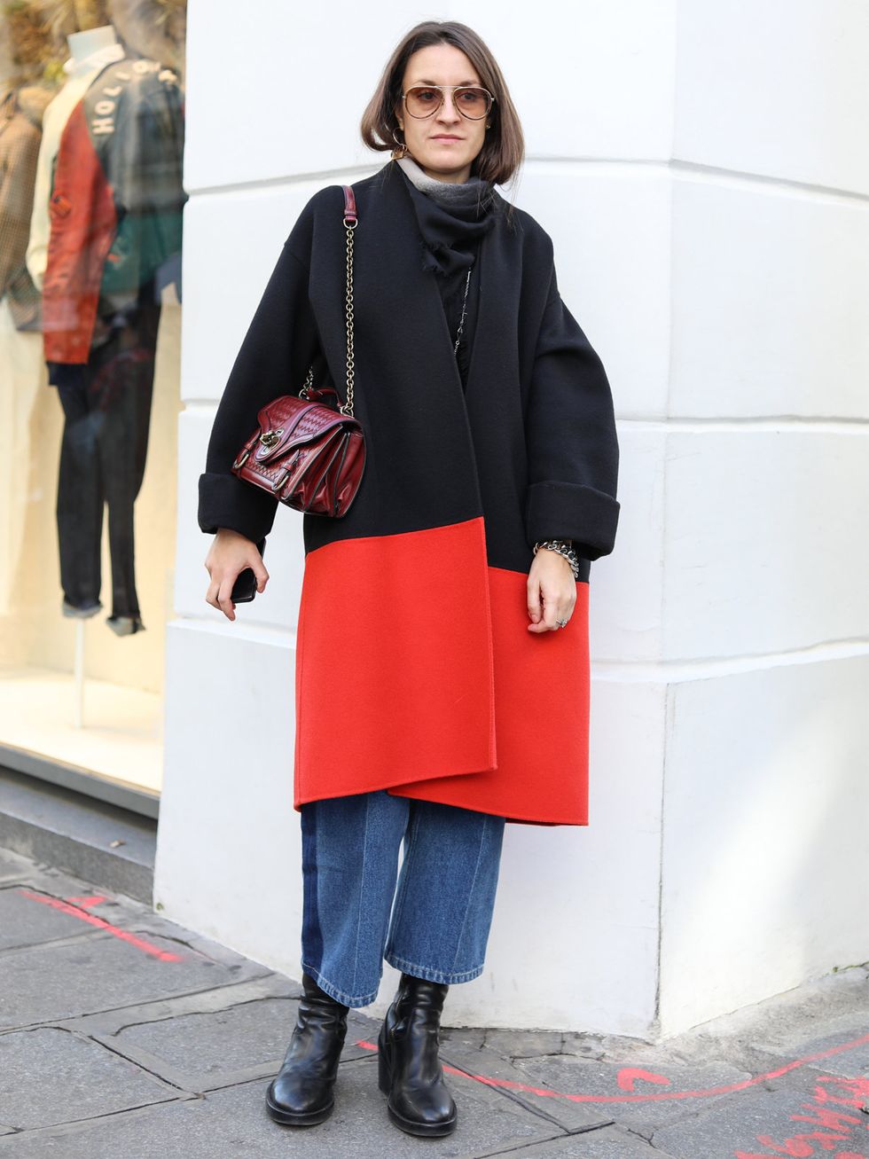 Clothing, Sleeve, Human body, Textile, Red, Standing, Outerwear, Style, Street fashion, Bag, 