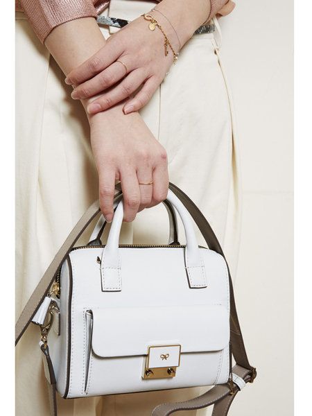 Product, Brown, Shoulder, Hand, Joint, Bag, White, Style, Fashion accessory, Wrist, 