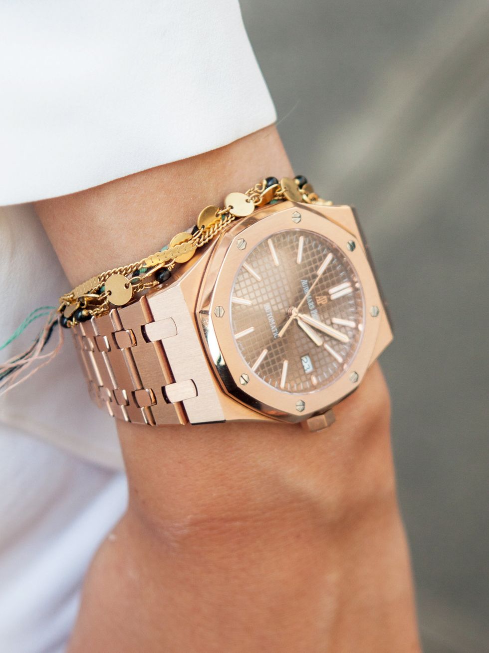 Brown, Analog watch, Skin, Watch, Wrist, Photograph, Joint, Fashion accessory, Khaki, Watch accessory, 