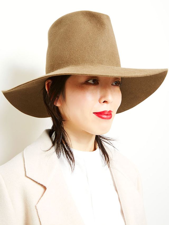 Clothing, Hat, Lip, Brown, Hairstyle, Skin, Sleeve, Chin, Collar, Fashion accessory, 
