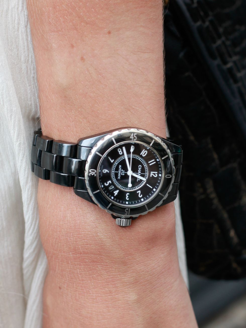 Wrist, Analog watch, Watch, Watch accessory, Fashion accessory, Font, Black, Metal, Everyday carry, Brand, 