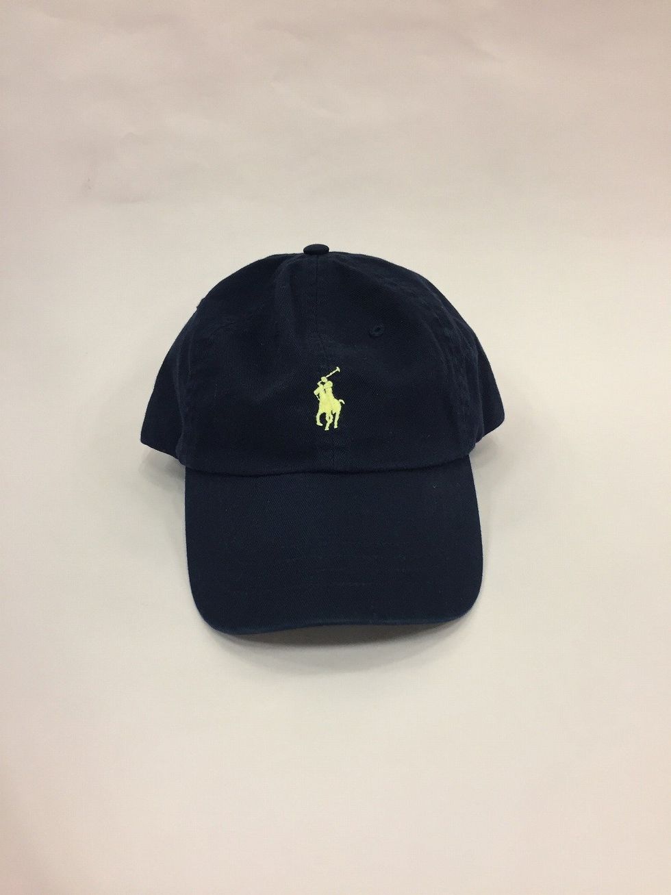 Cap, Clothing, Black, Baseball cap, Headgear, Cricket cap, Hat, Fashion accessory, Logo, 