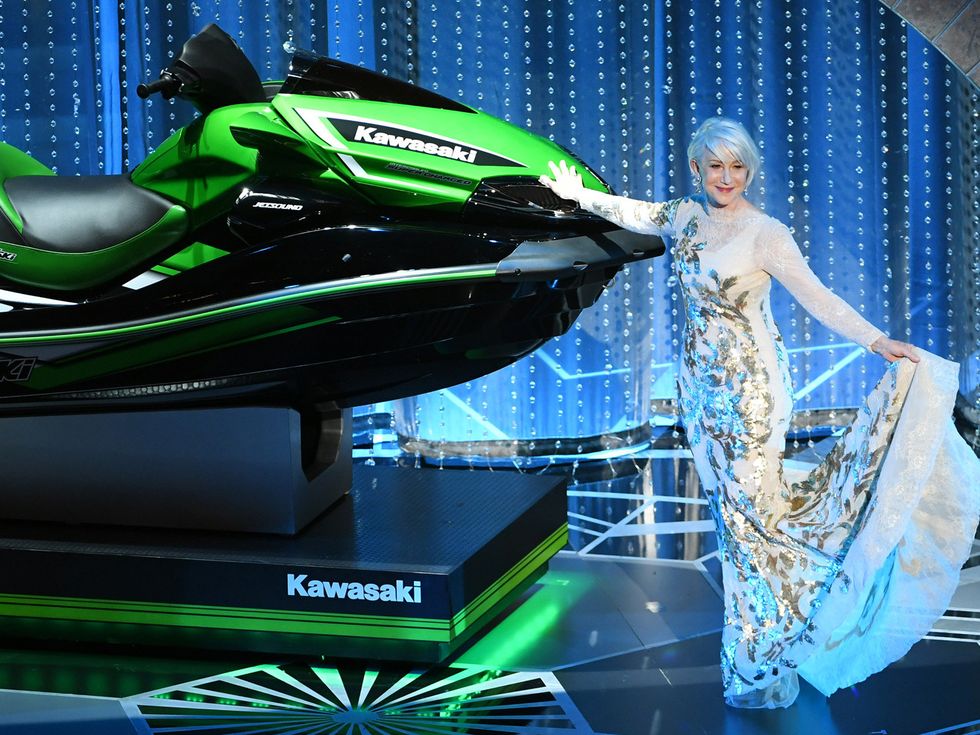 Dress, Personal water craft, Watercraft, Jet ski, Stage, Haute couture, Model, High heels, One-piece garment, 