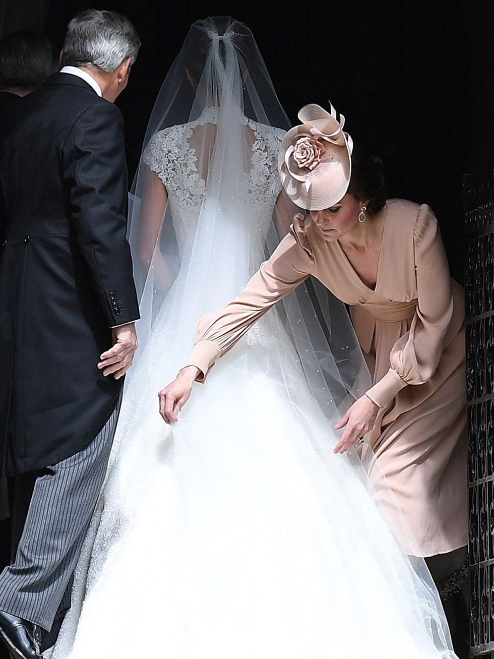 Bridal veil, Bridal clothing, Veil, Coat, Dress, Bridal accessory, Wedding dress, Photograph, Suit, Bride, 