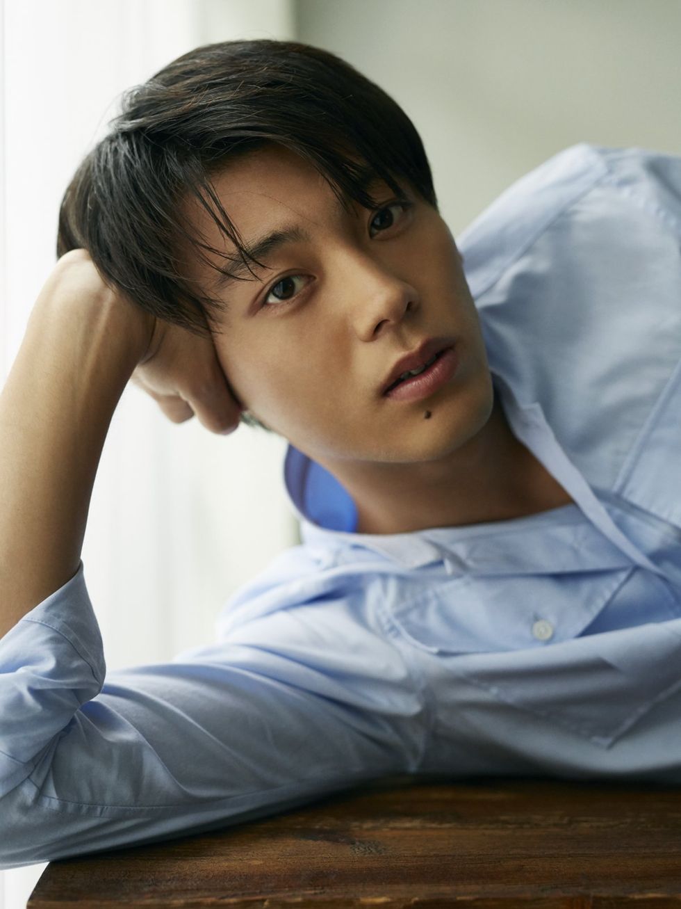Forehead, Chin, Arm, Nose, Sitting, Black hair, Muscle, Elbow, Neck, Photography, 
