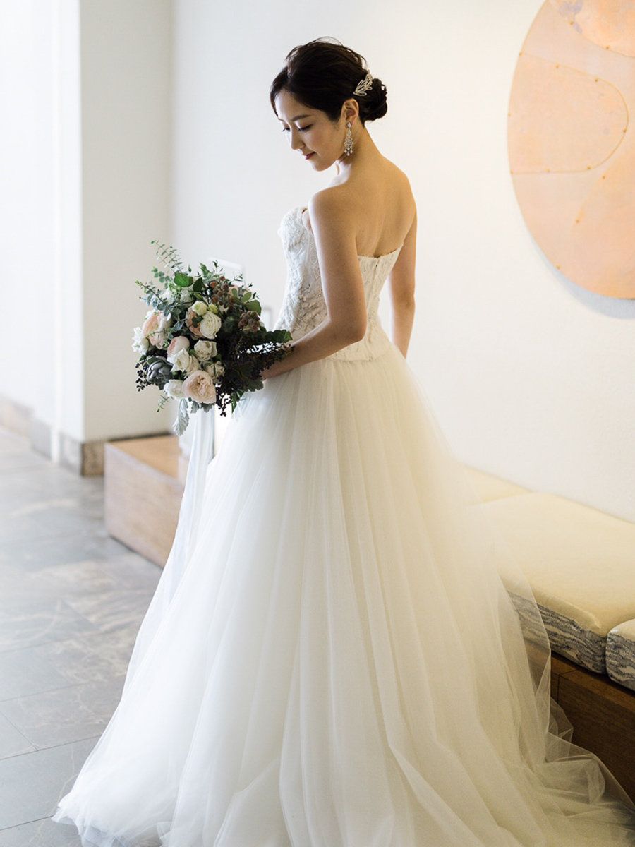 Clothing, Dress, Bridal clothing, Shoulder, Textile, Photograph, Joint, White, Wedding dress, Petal, 