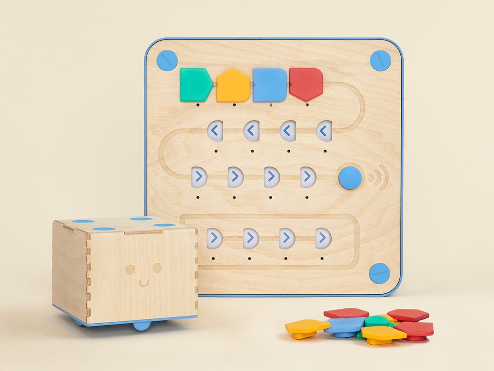 Beige, Circle, Cardboard, Paper product, Packing materials, Toy block, Wooden block, Carton, Paper, Educational toy, 