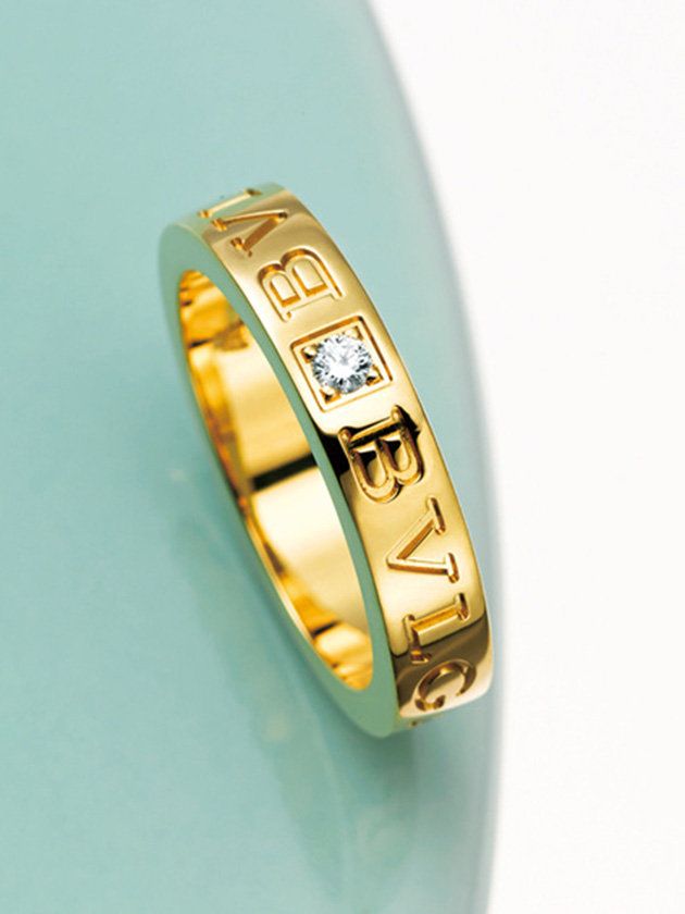 Ring, Jewellery, Fashion accessory, Yellow, Wedding ring, Engagement ring, Wedding ceremony supply, Body jewelry, Gemstone, Turquoise, 