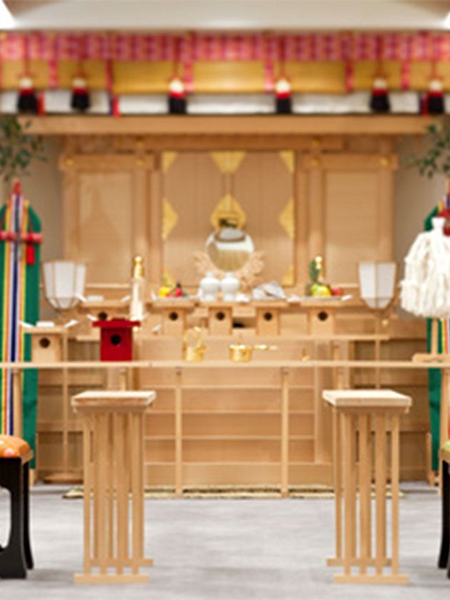 Furniture, Table, Yellow, Chair, Function hall, Shrine, Room, Altar, Place of worship, Ceremony, 