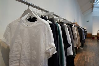 Textile, Clothes hanger, Room, Fashion, Grey, Outlet store, Boutique, Fashion design, Collection, Home accessories, 