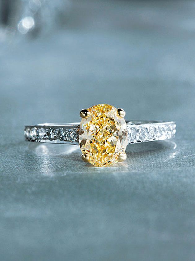 Jewellery, Engagement ring, Fashion accessory, Ring, Diamond, Yellow, Body jewelry, Gemstone, Wedding ring, Macro photography, 