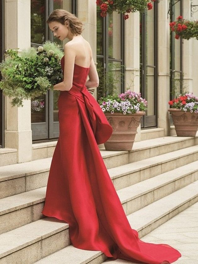 Dress, Gown, Clothing, Bridal party dress, Shoulder, Fashion model, Red, A-line, Formal wear, Strapless dress, 