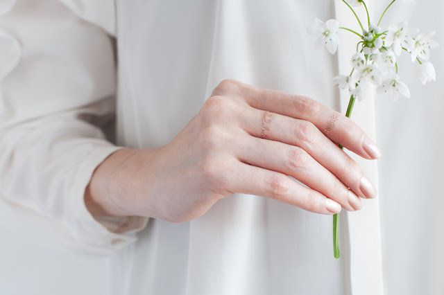 Finger, Hand, Petal, White, Wrist, Bouquet, Cut flowers, Nail, Gesture, Bridal clothing, 
