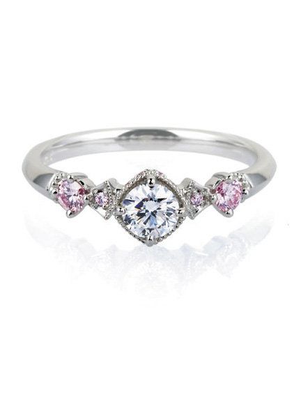 Jewellery, Ring, Fashion accessory, Engagement ring, Pre-engagement ring, Diamond, Body jewelry, Gemstone, Platinum, Metal, 
