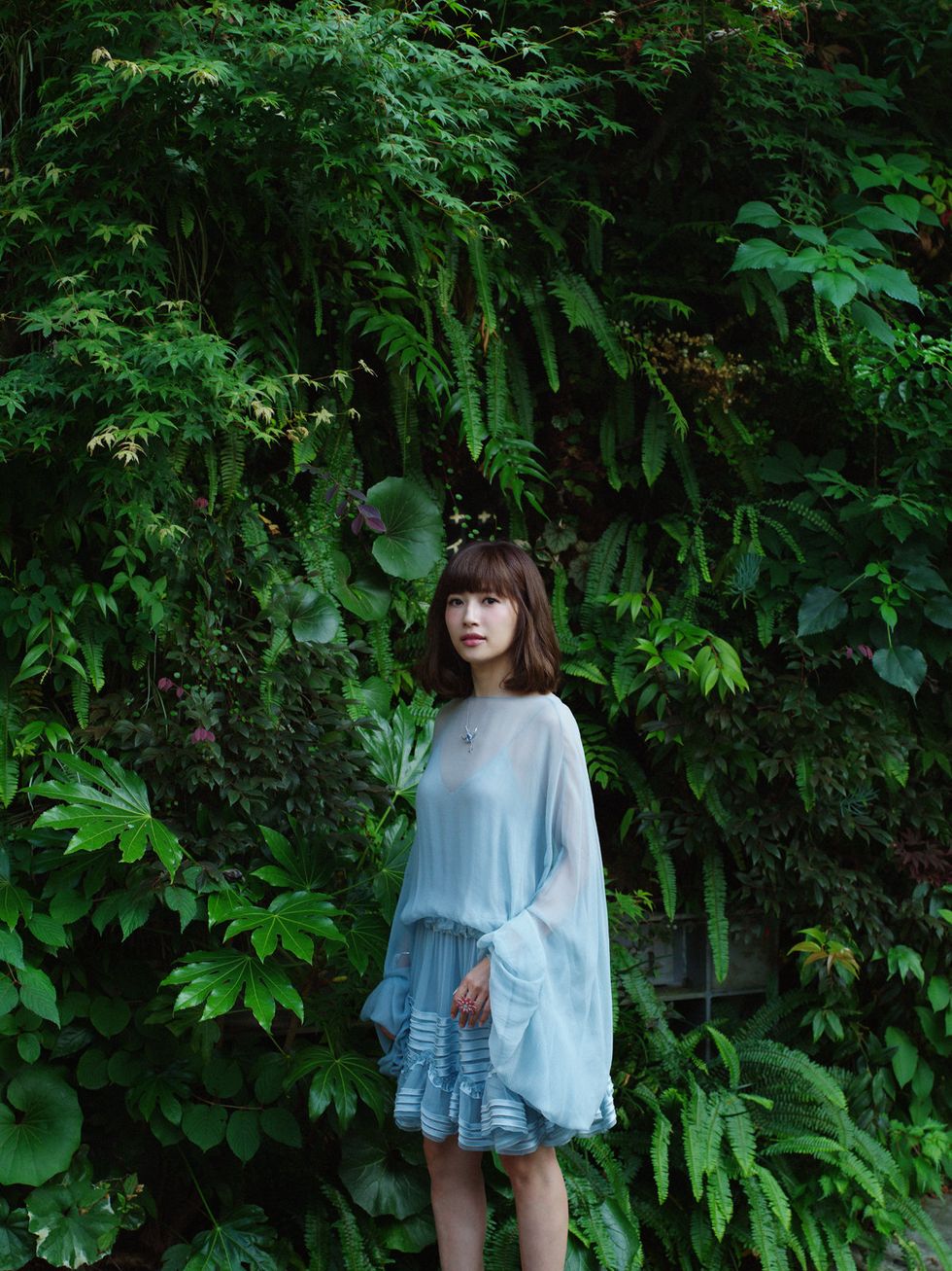 Clothing, Dress, Forest, Shrub, One-piece garment, Terrestrial plant, Toy, Day dress, Jungle, Long hair, 
