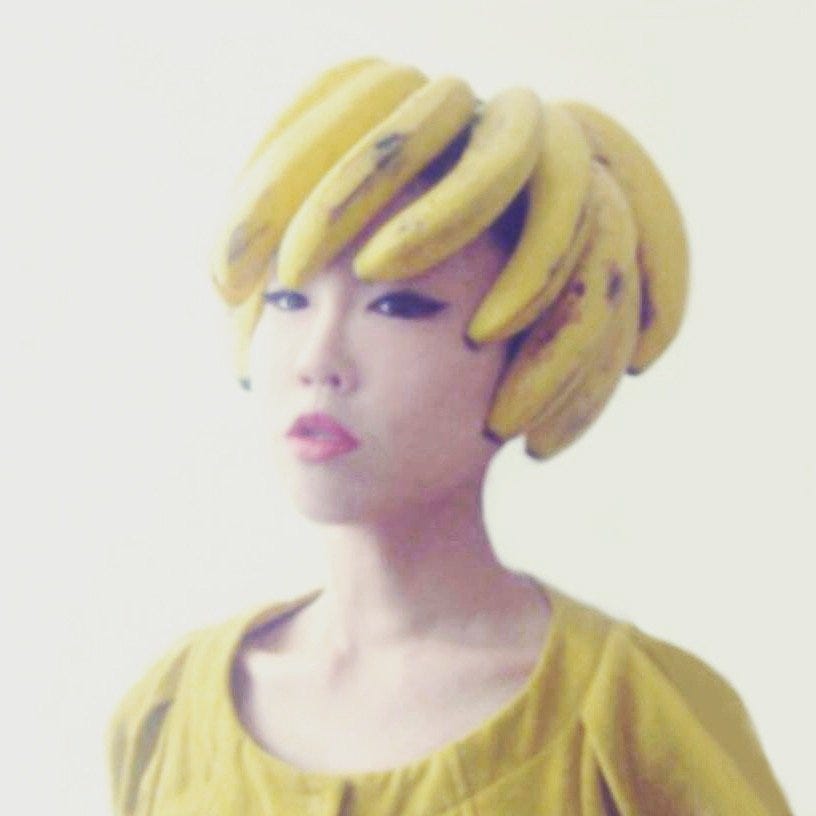 Yellow, Hairstyle, Chin, Forehead, Style, Jaw, Headgear, Neck, Turban, Hair coloring, 