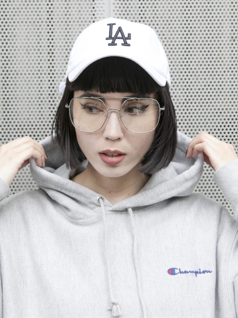 Eyewear, Glasses, Vision care, Lip, Cap, Sleeve, Textile, Jacket, Winter, Baseball cap, 