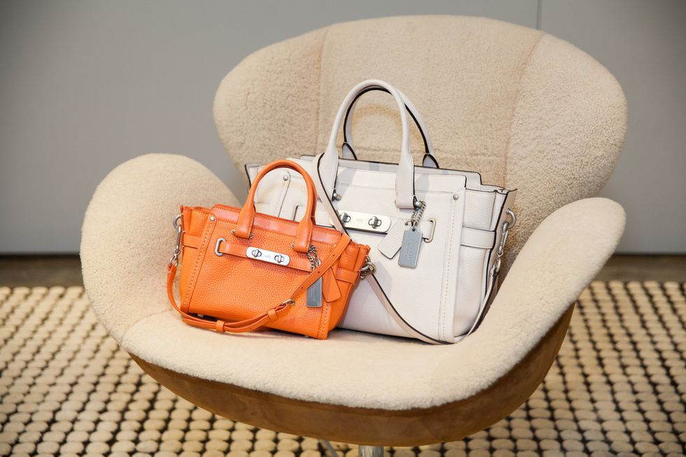 Product, Bag, Orange, Shoulder bag, Luggage and bags, Tan, Beige, Material property, Design, Peach, 