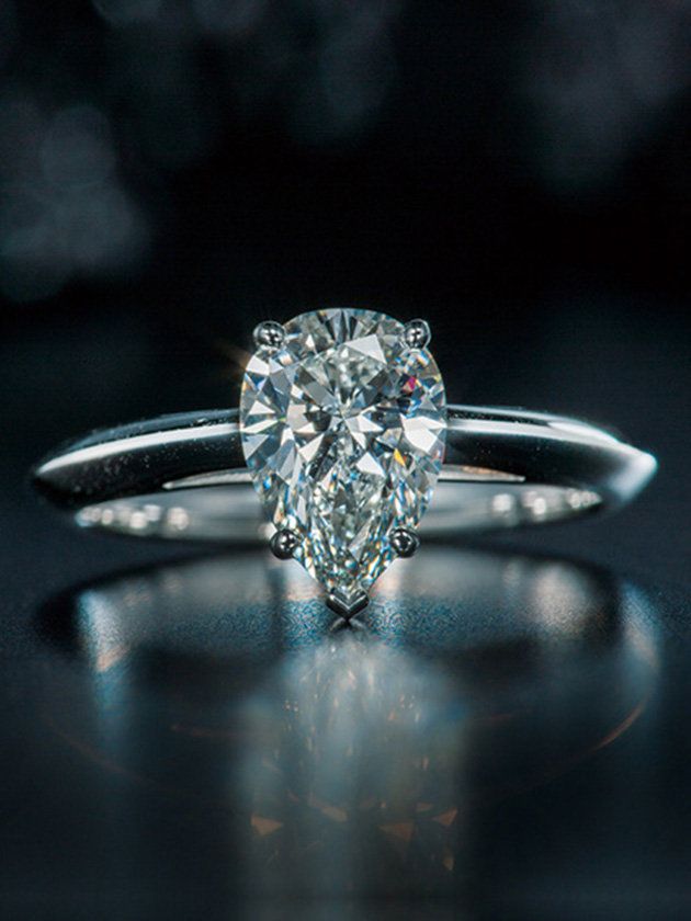 Ring, Engagement ring, Diamond, Pre-engagement ring, Jewellery, Fashion accessory, Macro photography, Platinum, Still life photography, Wedding ring, 