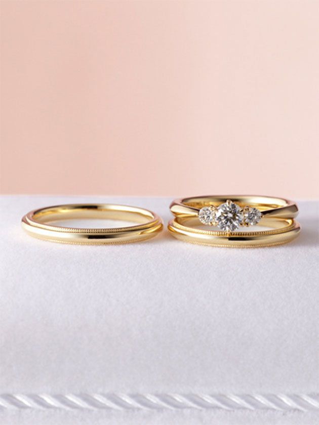 Ring, Fashion accessory, Wedding ring, Jewellery, Yellow, Engagement ring, Wedding ceremony supply, Body jewelry, Metal, Diamond, 