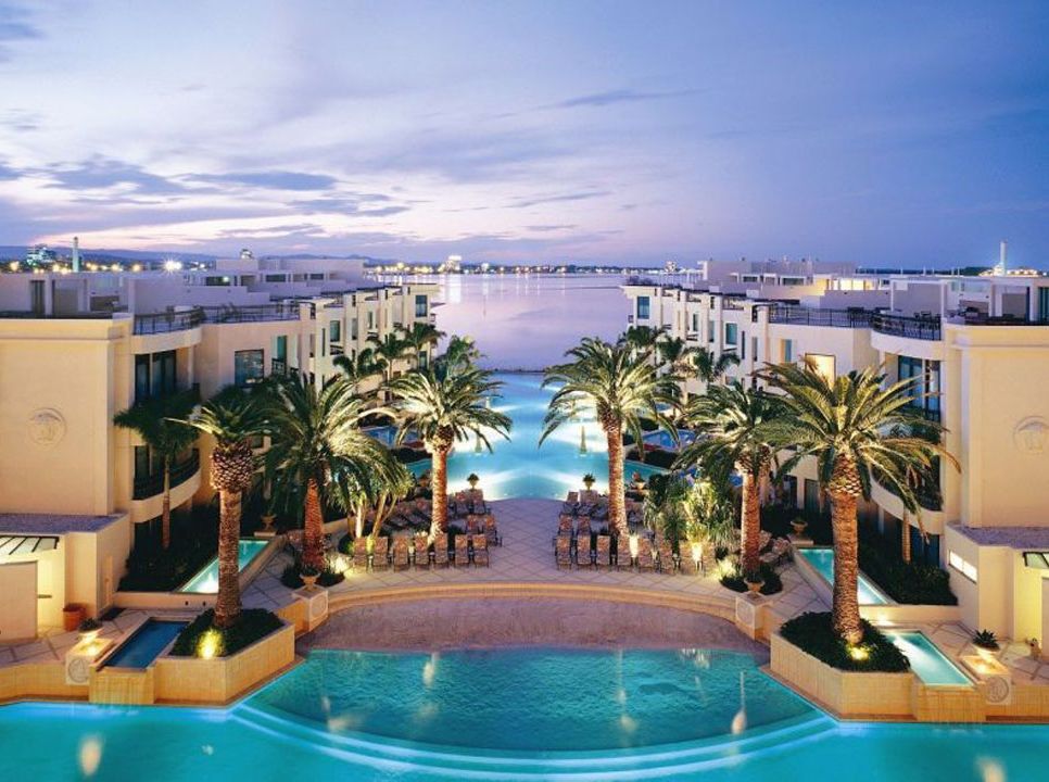 Swimming pool, Resort, Real estate, Arecales, Aqua, Azure, Flowering plant, Seaside resort, Majorelle blue, Apartment, 
