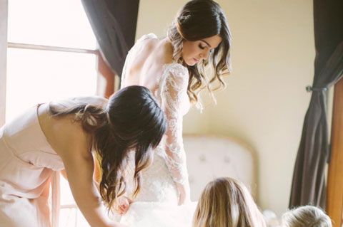 Photograph, Wedding dress, Dress, Bridal clothing, Yellow, Gown, Bride, Photography, Ceremony, Bride getting dressed, 