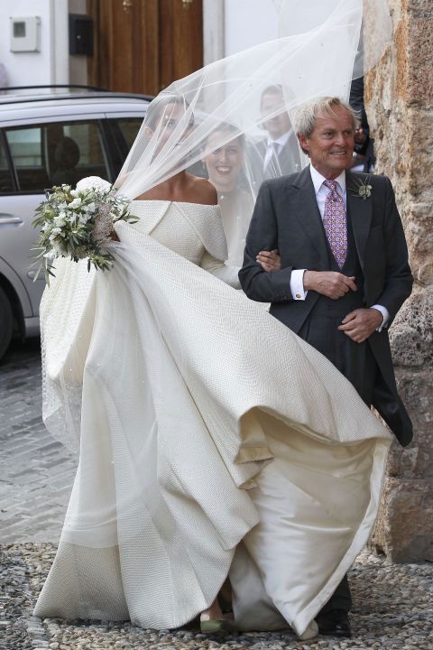 Clothing, Bridal veil, Trousers, Bridal clothing, Veil, Coat, Dress, Photograph, Wedding dress, Outerwear, 