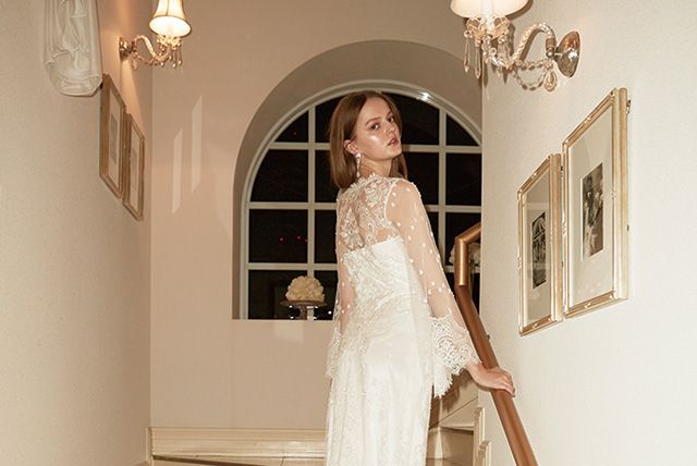 Lighting, Stairs, Sleeve, Dress, Shoulder, Bridal clothing, Textile, Photograph, White, Gown, 