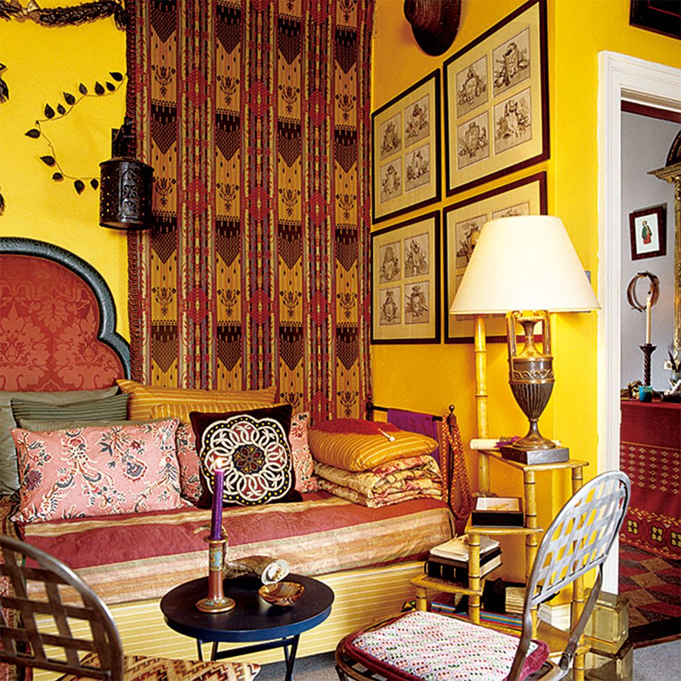Room, Interior design, Living room, Furniture, Orange, Yellow, Wall, Building, Table, House, 