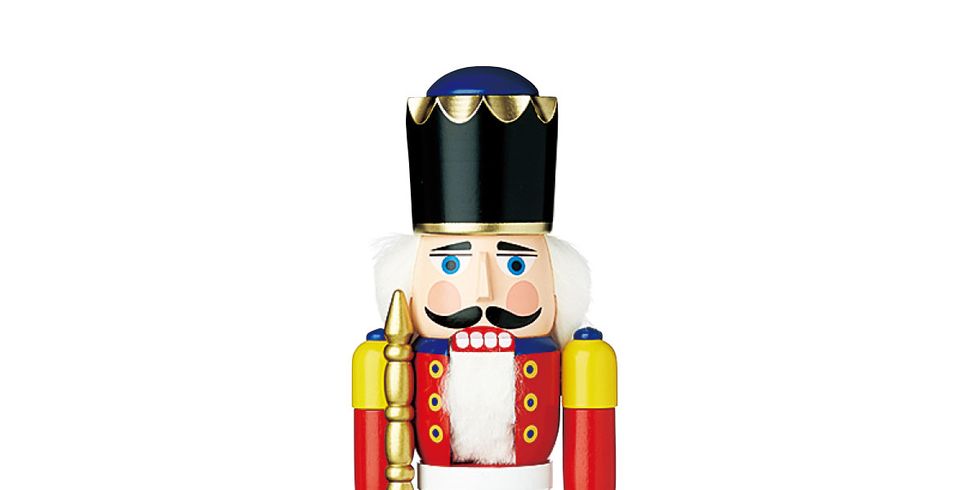 Decorative nutcracker, Toy, Figurine, Nutcracker, Cartoon, Christmas decoration, Action figure, Interior design, Fictional character, Animation, 