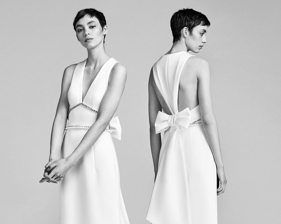 Fashion model, Dress, Clothing, White, Shoulder, Gown, Photograph, Bridal party dress, Standing, Fashion, 