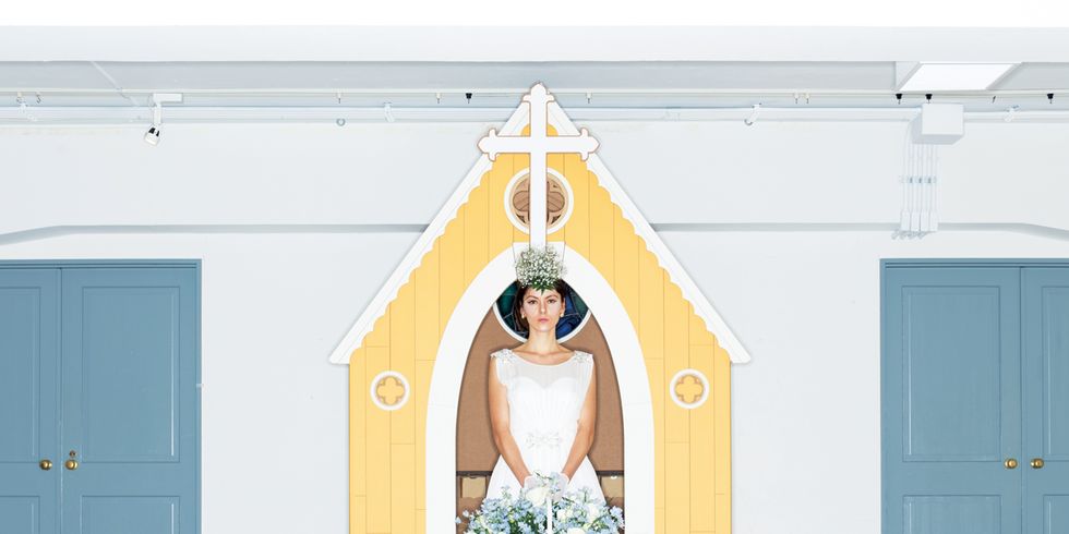 Wood, Yellow, Dress, Shoulder, Floor, Door, Flooring, White, Bridal clothing, Wedding dress, 