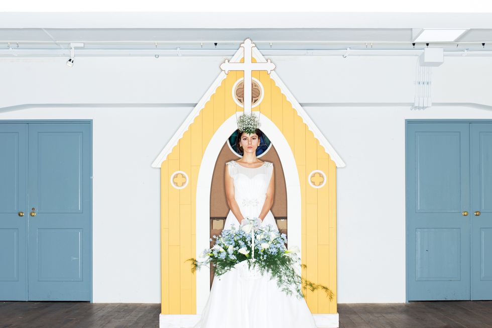 Wood, Yellow, Dress, Shoulder, Floor, Door, Flooring, White, Bridal clothing, Wedding dress, 