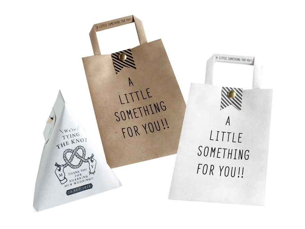 Paper bag, Shopping bag, Product, Font, Packaging and labeling, Bag, Label, Brand, Luggage and bags, Office supplies, 