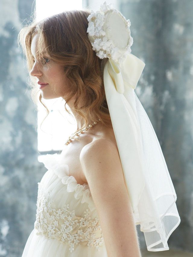 Clothing, Hairstyle, Shoulder, Dress, Petal, Textile, Photograph, Bridal clothing, Joint, White, 