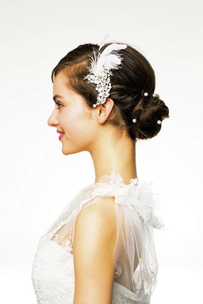 Ear, Hairstyle, Forehead, Shoulder, Bridal accessory, Hair accessory, Style, Headpiece, Wedding dress, Dress, 