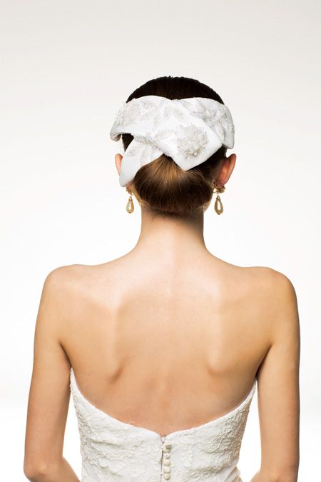 Ear, Hairstyle, Skin, Shoulder, Joint, Strapless dress, Style, Hair accessory, Elbow, Bridal clothing, 