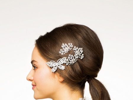 Clothing, Hairstyle, Skin, Bridal accessory, Forehead, Shoulder, Hair accessory, Headpiece, Style, Bridal clothing, 