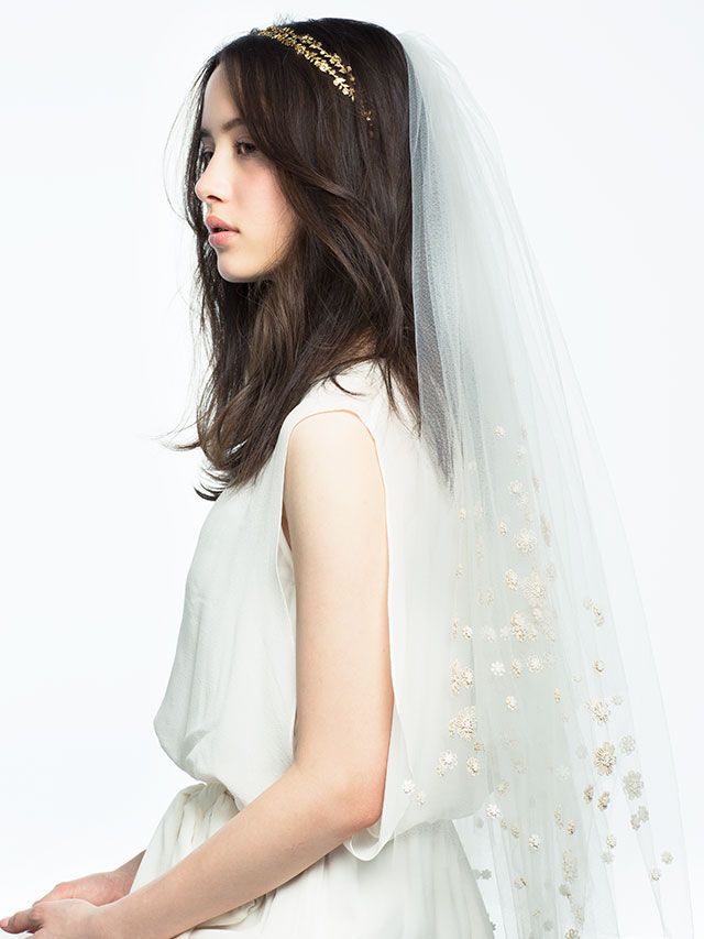 Clothing, Hairstyle, Skin, Bridal veil, Shoulder, Veil, Textile, Photograph, White, Bridal clothing, 