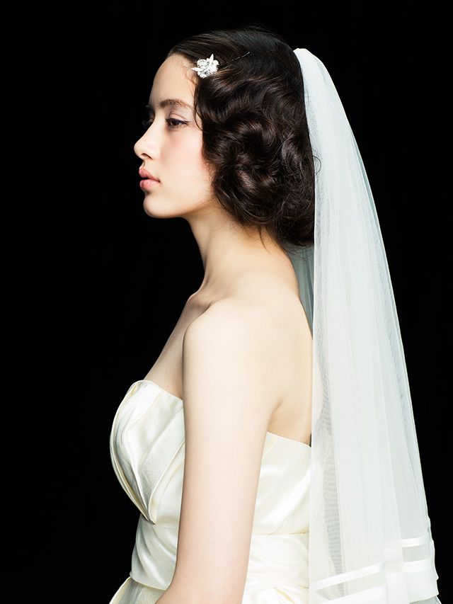 Clothing, Lip, Bridal veil, Hairstyle, Skin, Veil, Forehead, Shoulder, Eyebrow, Bridal clothing, 