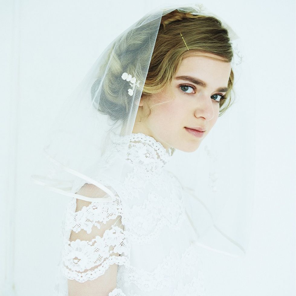 Bridal veil, Veil, Sleeve, Skin, Shoulder, Eyebrow, Bridal accessory, Textile, Bridal clothing, Dress, 
