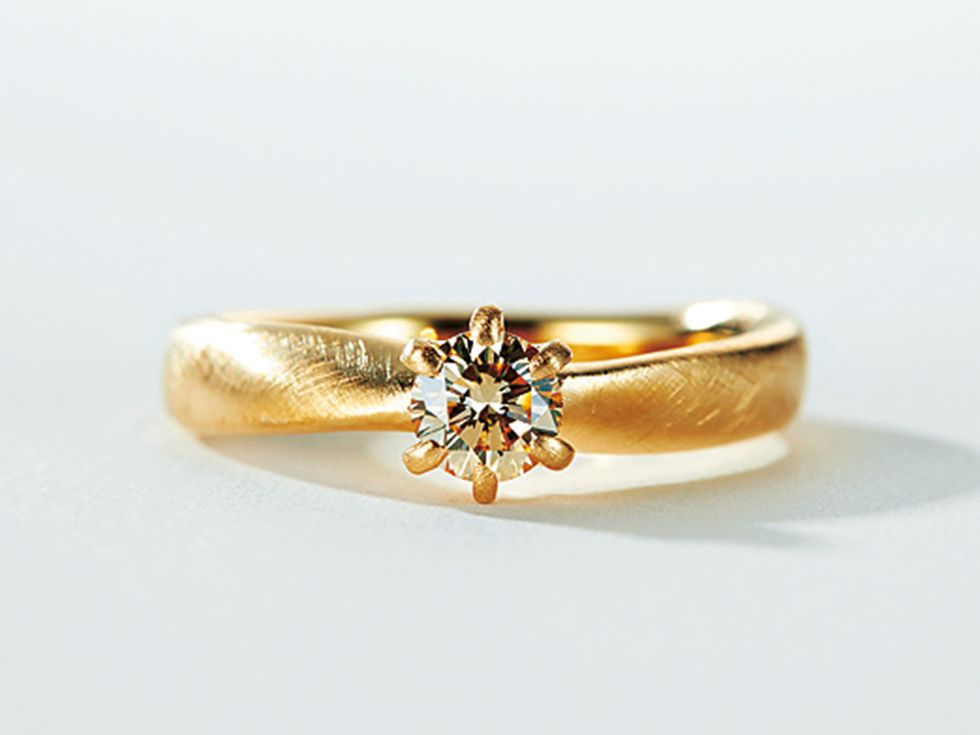Ring, Jewellery, Fashion accessory, Body jewelry, Engagement ring, Yellow, Gemstone, Wedding ring, Finger, Diamond, 
