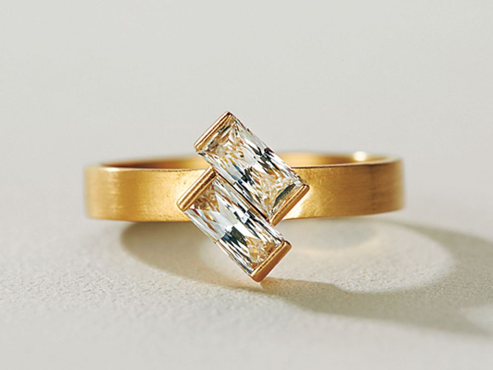 Ring, Fashion accessory, Jewellery, Yellow, Wedding ring, Engagement ring, Finger, Wedding ceremony supply, Diamond, Body jewelry, 