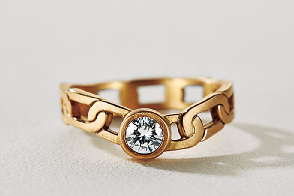 Ring, Fashion accessory, Jewellery, Engagement ring, Yellow, Diamond, Body jewelry, Metal, Finger, Gemstone, 