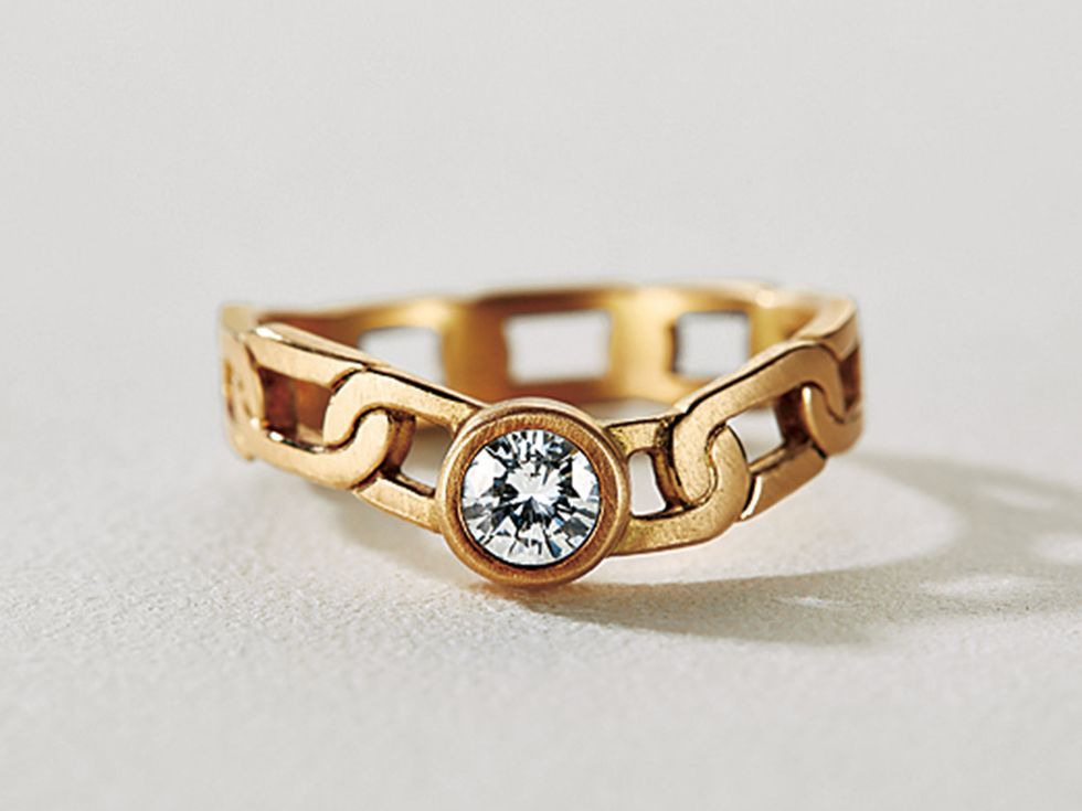 Ring, Fashion accessory, Jewellery, Engagement ring, Yellow, Diamond, Body jewelry, Metal, Finger, Gemstone, 