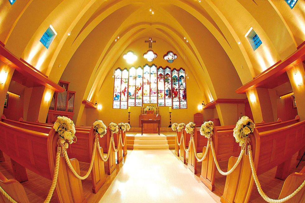 Chapel, Aisle, Yellow, Building, Architecture, Place of worship, Symmetry, Religious institute, Convent, Shrine, 